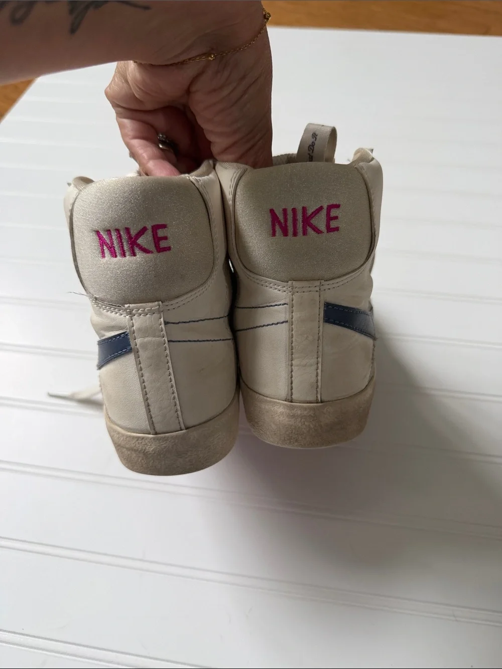 Nike Blazer Mid Top Sneakers in White and Blue Swoosh